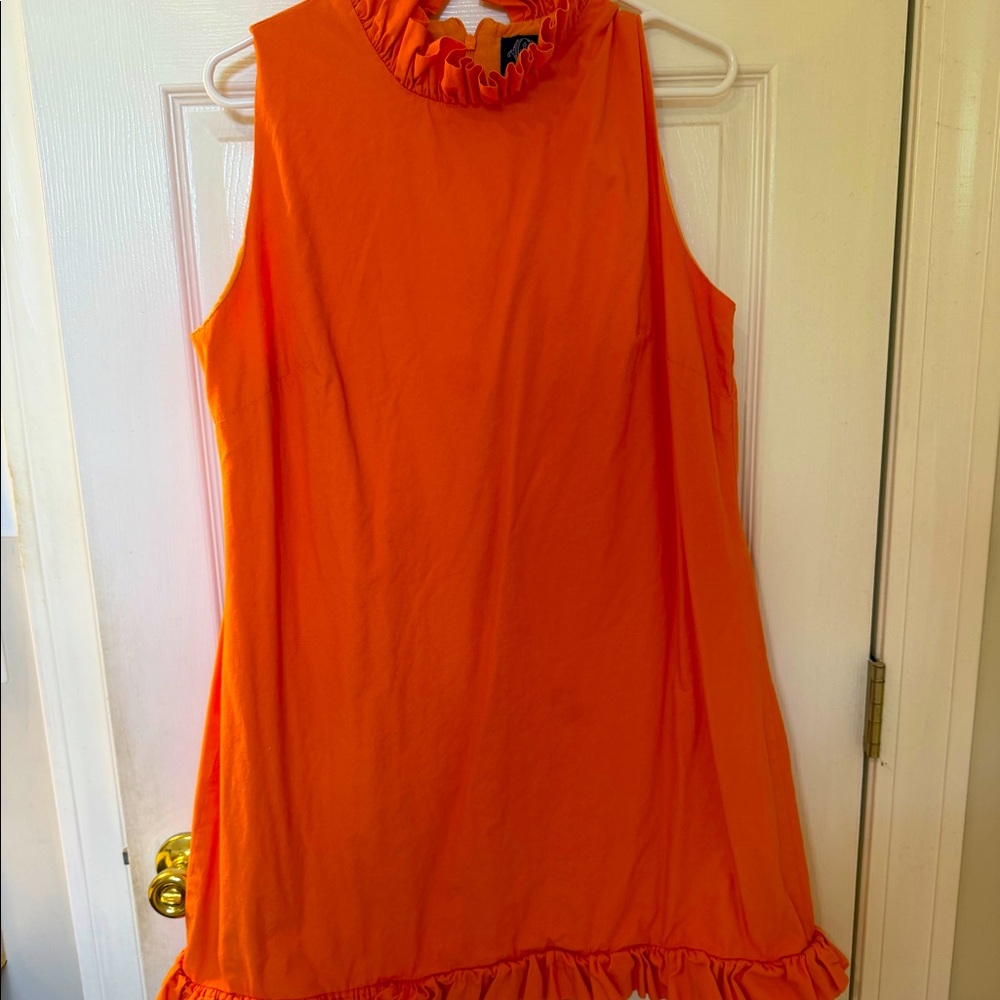 Elizabeth Wilson orange dress with ruffle neck